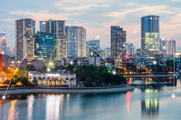 Naklejka premium Smart city and wireless communication network concept. Digital network connection lines of Hanoi at Hoang Cau lake