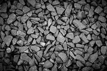 Crushed stone background, texture. Black and white.