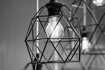 Fototapeta na wymiar Modern decorative lamps made of steel bars. black and white