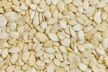 Background texture of pumpkin seeds. Top view.