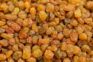Background and texture of dry raisins.