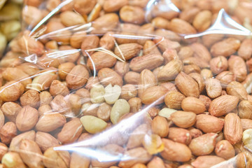 Packing from a transparent bag with Brazil nuts.
