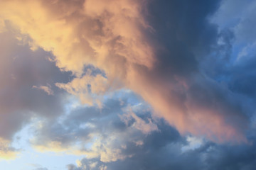 Fototapeta na wymiar Rainy sky with gray volumetric clouds.