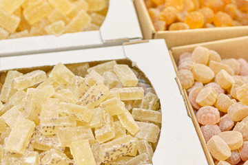 A counter of sweets from different marmalade.