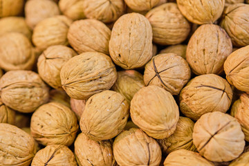 Background and texture of unpeeled walnut.