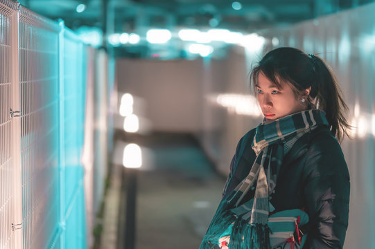 Beautiful Woman Portrait In Winter Clothing At Night In An Alley In Sendai, Japan