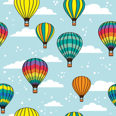 Obraz premium Vector seamless pattern with clouds and balloons