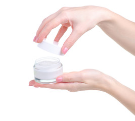 jar of cream beauty in hand on white background isolation