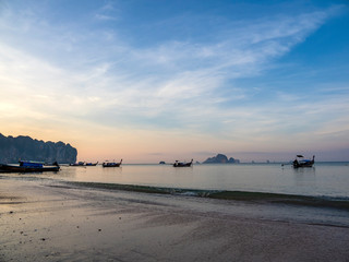 Traditional long tail boat on Ao Nang beach in Krabi Thailand