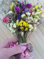 bouquet of flowers in hand