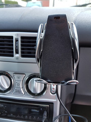 Car interior with cell phone holder