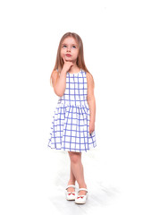 Shot of a  little  serious girl thinking about something, isolated