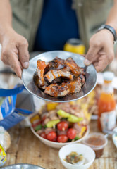 Grilled and smoked ribs with barbeque sauce