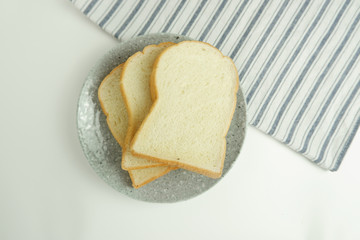 Top view slices of bread top view on white background