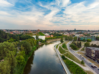 Fototapeta premium Beautiful aerial landscape of Neris river winding through Vilnius city.