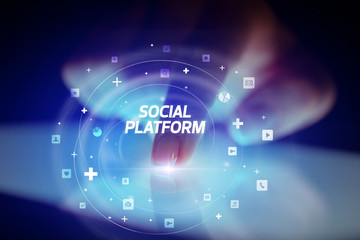 Finger touching tablet with social media icons and SOCIAL PLATFORM