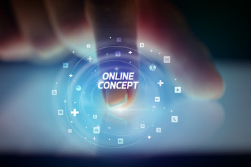 Finger touching tablet with social media icons and ONLINE CONCEPT