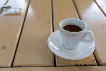 White Cup of Coffee on Wooden Tabletop.