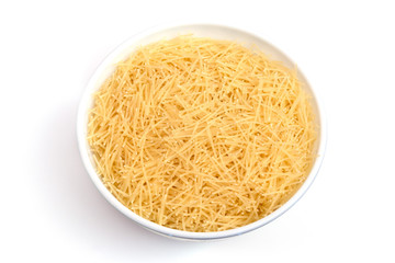 Vermicelli pasta in a wood bowl. white background