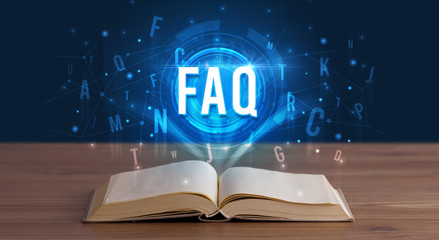 FAQ inscription coming out from an open book, digital technology concept