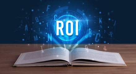 ROI inscription coming out from an open book, digital technology concept