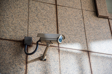 security video camera on the wall