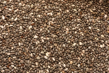 Mixed red, white and black quinoa as an abstract background texture