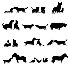 Collection of vector silhouette of different animals in grass on white background.