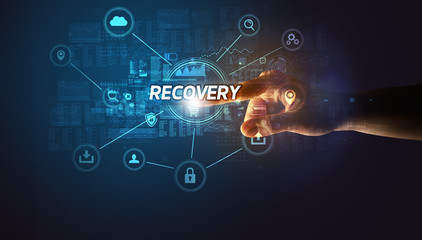 Hand touching RECOVERY inscription, Cybersecurity concept