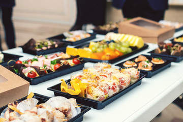 Buffet table with fruits and various kind of food. Business meeting.
