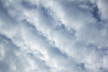 Obraz premium Thick clouds on a blue sky