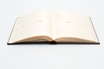 empty open photo album on a white background