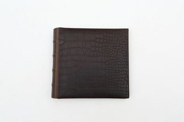 Leather  brown photo album on a white background