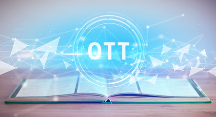 Open book with OTT abbreviation, modern technology concept