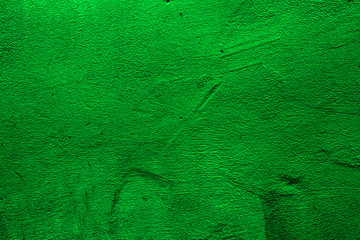 Green colored abstract wall background with textures of shades of green
