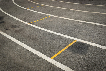 black tarmac asphalt of running track, athletic sport background