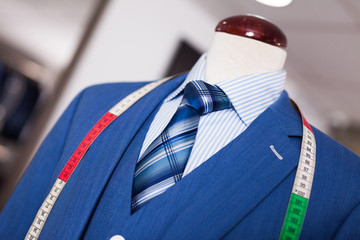jacket with shirt and tie on mannequin