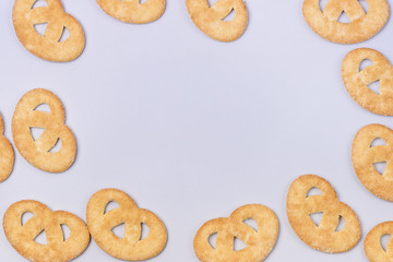 Sweet Small Pretzel on a Blue Background Top View Horizontal Frame