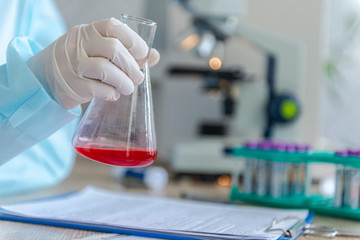 A doctor is looking for a coronavirus vaccine in his laboratory.