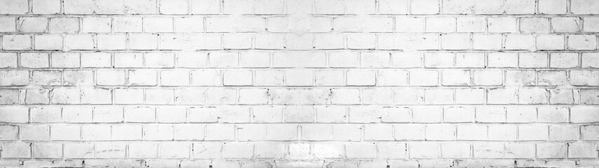 White painted damaged rustic brick wall texture banner panorama	