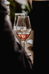 Obraz na płótnie Canvas White and rose wine tasting close up view. Drop wine carafe.