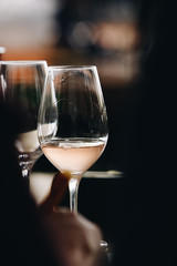 White and rose wine tasting close up view. Drop wine carafe.