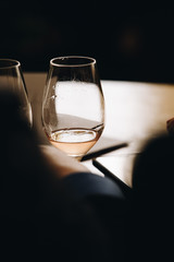 White and rose wine tasting close up view. Drop wine carafe.