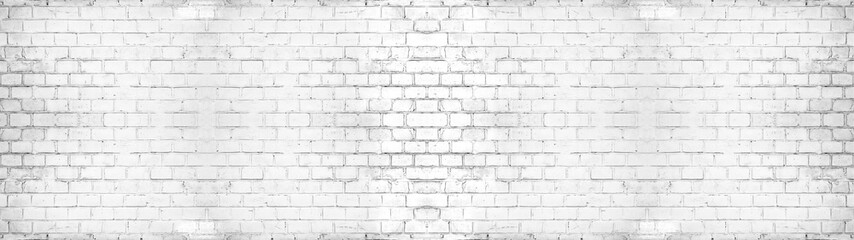 White painted damaged rustic brick wall texture banner panorama	