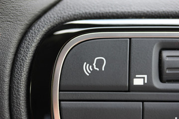 Speech button on car steering wheel