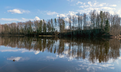 the view of the calm lake, the blue sky