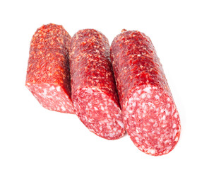 Smoked sausage in assortment on a white background