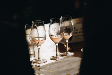 White, red and rose wine tasting close up view. Drop wine carafe.