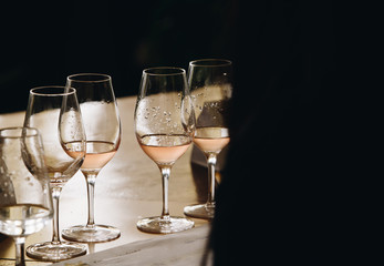 White, red and rose wine tasting close up view. Drop wine carafe.