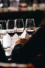 White, red and rose wine tasting close up view. Drop wine carafe.